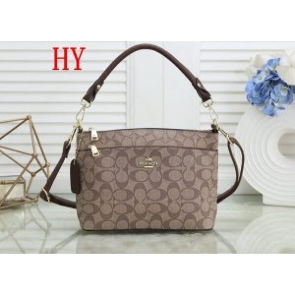 Coach Casual Handbag With Sling and Dust Bag